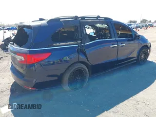 2018 Honda Odyssey EX-L z VIN 5FNRL6H79JB041040, wystawiony jako IAAI lot #41883128 z przebiegiem Nie podano mil oraz . Historia ofert i sprzedaży dostępna na DreamBid. Obrazek 4.