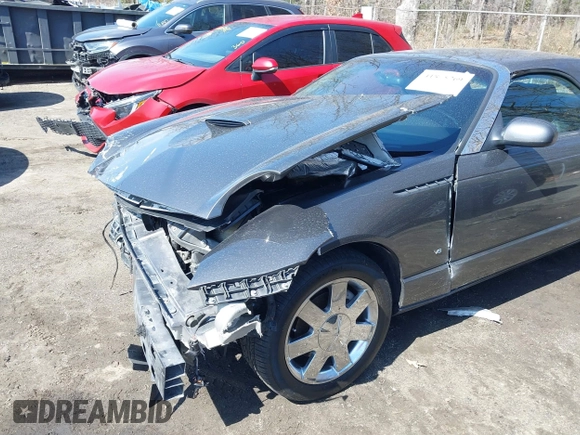 2003 Ford Thunderbird Deluxe z VIN 1FAHP60A23Y101899, wystawiony jako IAAI lot #41805269 z przebiegiem Nie podano mil oraz . Historia ofert i sprzedaży dostępna na DreamBid. Obrazek 6.