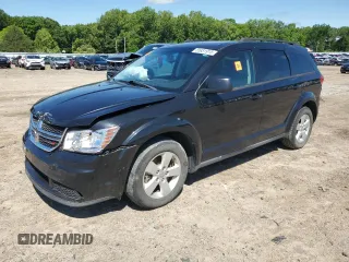 2013 Dodge Journey SE z VIN 3C4PDCAB5DT729415, wystawiony jako Copart lot #55851915 z przebiegiem 128 782 mil mil oraz Szkoda całkowita • Salvage title. Historia ofert i sprzedaży dostępna na DreamBid. Obrazek 1.
