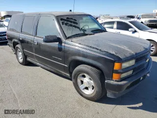 2000 Chevrolet Tahoe Limited with VIN 1GNEC13R7YR221297, listed as a Copart auction lot 75504254 with 246,714 mi miles and Clean Title. Bid and sale history available at carsss.com. Image 4.