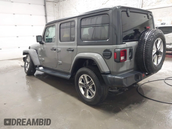 2019 Jeep Wrangler Unlimited Sahara with VIN 1C4HJXEG9KW656454, listed as a IAAI auction lot 41648236 with 75,403 mi miles and . Bid and sale history available at DreamBid. Image 3.
