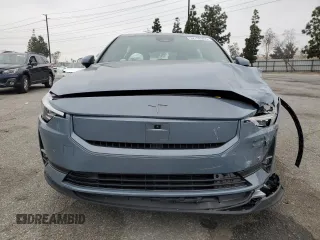 2024 Polestar 2 z VIN YSMFD3KA1RL220740, wystawiony jako Copart lot #52755355 z przebiegiem 9 416 mil mil oraz Szkoda całkowita • Salvage title. Historia ofert i sprzedaży dostępna na DreamBid. Obrazek 5.