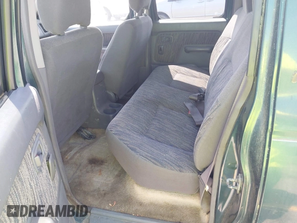 2000 Nissan Frontier XE with VIN 1N6ED27T2YC353126, listed as a IAAI auction lot 42092445 with 189,992 mi miles and . Bid and sale history available at DreamBid. Image 8.