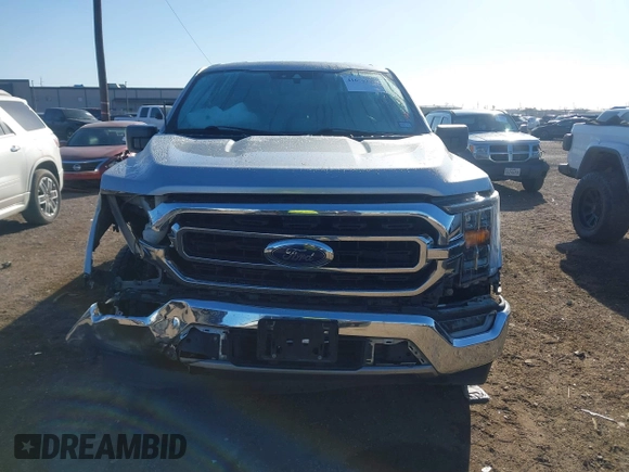 2021 Ford F-150 XL with VIN 1FTEW1CP3MFC30671, listed as a IAAI auction lot 41670207 with 56,540 mi miles. Bid and sale history available at carsss.com. Image 12.