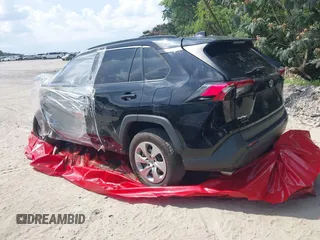 2019 Toyota RAV4 LE with VIN 2T3H1RFV3KC015535, listed as a IAAI auction lot 41999076 with 99,375 mi miles and . Bid and sale history available at DreamBid. Image 3.