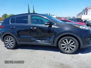 2019 Kia Sportage EX with VIN KNDPN3AC2K7602435, listed as a IAAI auction lot 42233427 with 58,730 mi miles and . Bid and sale history available at DreamBid. Image 13.