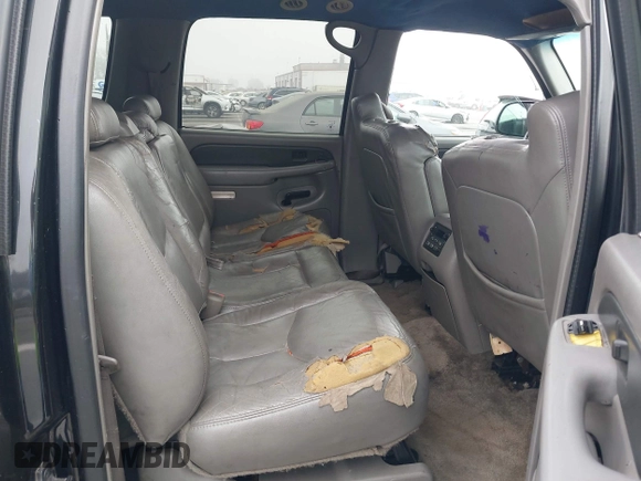 2003 Chevrolet Suburban LT z VIN 3GNFK16Z33G213287, wystawiony jako IAAI lot #41670719 z przebiegiem 190 245 mil mil oraz . Historia ofert i sprzedaży dostępna na DreamBid. Obrazek 8.