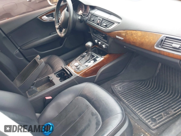 2013 Audi A7 Premium Plus with VIN WAUYGAFC1DN069906, listed as a IAAI auction lot 41906962 with 203,149 mi miles and . Bid and sale history available at DreamBid. Image 5.