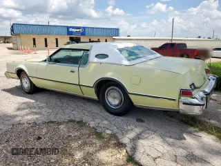 1975 Lincoln Continental z VIN 5Y89A889209, wystawiony jako Copart lot #64262235 z przebiegiem 86 783 mil mil oraz Czysty tytuł • Clean title. Historia ofert i sprzedaży dostępna na DreamBid. Obrazek 2.