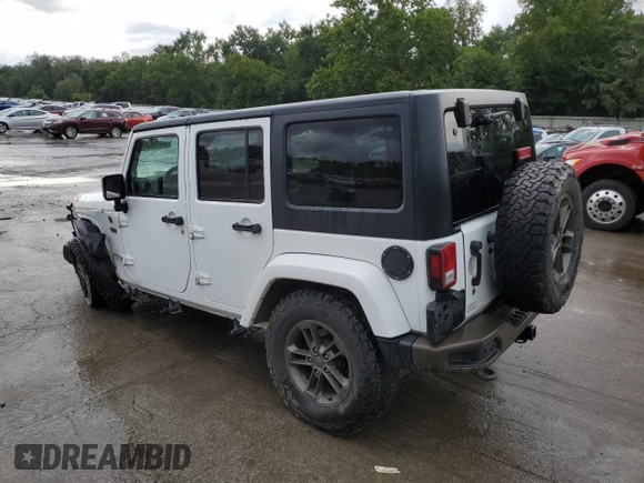 2016 Jeep Wrangler Unlimited Sahara with VIN 1C4BJWEGXGL245041, listed as a Copart auction lot 88099245 with 134,768 mi miles and Salvage title. Bid and sale history available at DreamBid. Image 2.