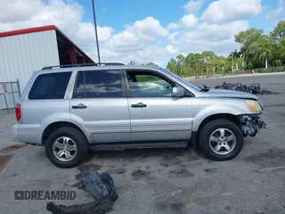2003 Honda Pilot EX with VIN 2HKYF18603H504829, listed as a IAAI auction lot 42083247 with 247,429 mi miles and . Bid and sale history available at carsss.com. Image 13.