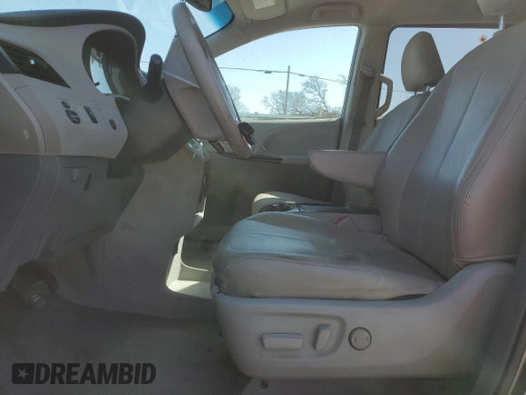 2012 Toyota Sienna LE AAS with VIN 5TDKK3DC8CS216589, listed as a Copart auction lot 48870695 with 219,270 mi miles and Salvage Title. Bid and sale history available at carsss.com. Image 7.