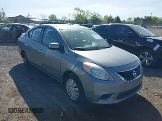 2014 Nissan Versa SV with VIN 3N1CN7AP5EL809218, listed as a IAAI auction lot 42096891 with 87,559 mi miles. Bid and sale history available at carsss.com. Image 1.
