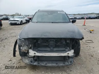 2021 Mazda CX-9 Carbon Edition z VIN JM3TCADY9M0514372, wystawiony jako Copart lot #52902555 z przebiegiem 99 812 mil mil oraz Szkoda całkowita • Salvage title. Historia ofert i sprzedaży dostępna na DreamBid. Obrazek 5.