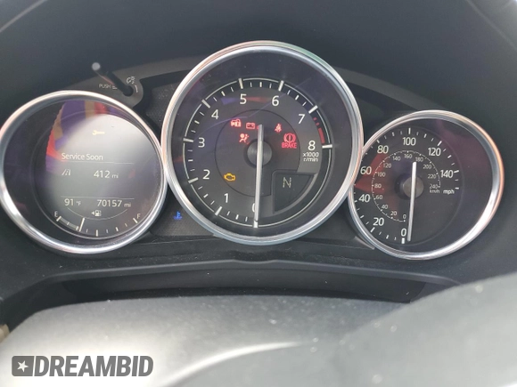 2020 Mazda MX-5 Miata Grand Touring z VIN JM1NDAM70L0414102, wystawiony jako Copart lot #55261575 z przebiegiem 70 157 mil mil oraz Szkoda całkowita • Salvage title. Historia ofert i sprzedaży dostępna na DreamBid. Obrazek 9.