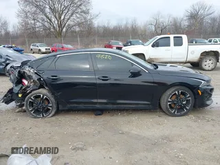2022 Kia K5 GT-Line z VIN 5XXG64J29NG115786, wystawiony jako IAAI lot #42094520 z przebiegiem 84 234 mil mil oraz . Historia ofert i sprzedaży dostępna na DreamBid. Obrazek 13.