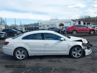 2013 Volkswagen CC Sport with VIN WVWBN7AN9DE516590, listed as a IAAI auction lot 41684586 with 153,312 mi miles. Bid and sale history available at carsss.com. Image 13.