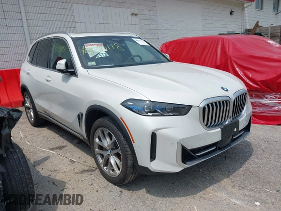 2024 BMW X5 xDrive40i z VIN 5UX23EU07R9S40743, wystawiony jako IAAI lot #40135118 z przebiegiem 303 mil mil oraz . Historia ofert i sprzedaży dostępna na DreamBid. Obrazek 1.