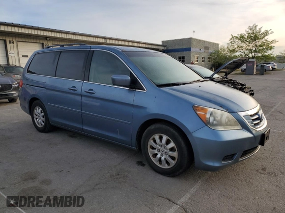 2009 Honda Odyssey EX-L with VIN 5FNRL38759B004710, listed as a Copart auction lot 54210425 with 171,674 mi miles and Salvage Title. Bid and sale history available at DreamBid. Image 4.