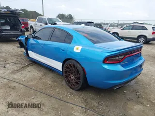 2015 Dodge Charger RT with VIN 2C3CDXCTXFH918878, listed as a IAAI auction lot 41953418 with 110,202 mi miles and . Bid and sale history available at DreamBid. Image 3.
