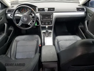 2012 Volkswagen Passat SE z VIN 1VWBH7A3XCC009775, wystawiony jako Copart lot #56469285 z przebiegiem 145 265 mil mil oraz Szkoda całkowita • Salvage title. Historia ofert i sprzedaży dostępna na DreamBid. Obrazek 8.