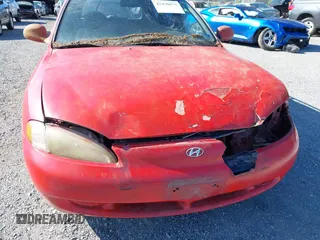 1997 Hyundai Elantra z VIN KMHJW34M1VU075495, wystawiony jako IAAI lot #42430074 z przebiegiem 207 458 mil mil oraz . Historia ofert i sprzedaży dostępna na DreamBid. Obrazek 13.