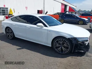 2016 Audi A7 Prestige with VIN WAU2GAFC1GN158272, listed as a IAAI auction lot 42012170 with 99,775 mi miles and . Bid and sale history available at DreamBid. Image 1.