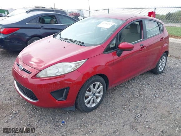 2011 Ford Fiesta SE with VIN 3FADP4EJ6BM128965, listed as a IAAI auction lot 41932743 with 123,057 mi miles. Bid and sale history available at carsss.com. Image 2.
