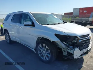 2018 Chevrolet Traverse Premier z VIN 1GNEVJKW0JJ164995, wystawiony jako IAAI lot #42203764 z przebiegiem 151 172 mil mil oraz . Historia ofert i sprzedaży dostępna na DreamBid. Obrazek 1.