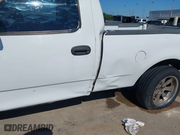2000 Ford F-150 with VIN 1FTZF1728YKA54035, listed as a IAAI auction lot 42236191 with Not provided miles and . Bid and sale history available at DreamBid. Image 6.