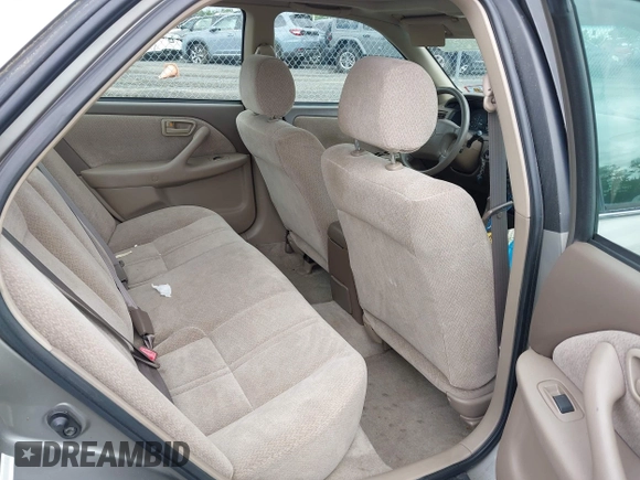 2001 Toyota Camry CE z VIN 4T1BG22K01U028448, wystawiony jako IAAI lot #42324384 z przebiegiem 190 325 mil mil oraz . Historia ofert i sprzedaży dostępna na DreamBid. Obrazek 8.