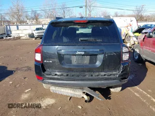 2016 Jeep Compass Sport with VIN 1C4NJDBB0GD571824, listed as a IAAI auction lot 41650610 with 147,261 mi miles. Bid and sale history available at carsss.com. Image 16.