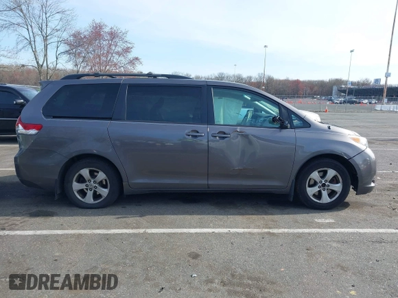 2012 Toyota Sienna LE AAS with VIN 5TDKK3DC5CS279651, listed as a IAAI auction lot 41941859 with 131,262 mi miles and . Bid and sale history available at DreamBid. Image 13.