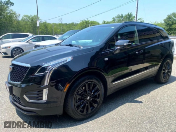 2021 Cadillac XT5 AWD Sport with VIN 1GYKNHRS7MZ16XXX, listed as a Copart auction lot 61952565 with 93,253 mi miles and Clean title. Bid and sale history available at DreamBid. Image 2.