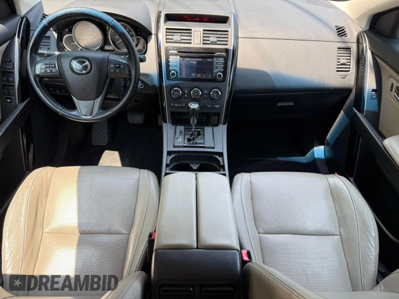 2014 Mazda CX-9 Touring с VIN JM3TB3CV2E0430544, выставлен на аукционе Copart как лот 65481395 с пробегом 135 785 миль миль и Чистый • Clean title. История ставок и продаж доступна на DreamBid. Изображение 9.