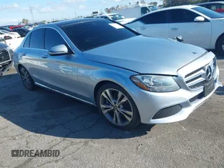 2018 Mercedes-Benz C 300 with VIN 55SWF4JB1JU244077, listed as a IAAI auction lot 41795613 with 90,900 mi miles and . Bid and sale history available at DreamBid. Image 1.