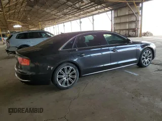 2011 Audi A8 with VIN WAURVAFD4BN004628, listed as a Copart auction lot 52244125 with 182,631 mi miles and Clean title. Bid and sale history available at DreamBid. Image 3.