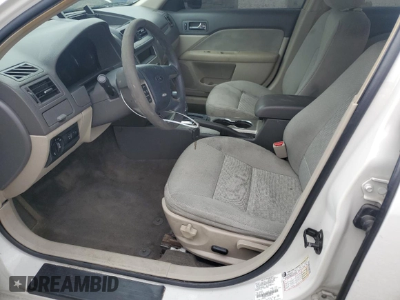 2010 Ford Fusion SE z VIN 3FAHP0HA9AR306505, wystawiony jako Copart lot #55057295 z przebiegiem 214 141 mil mil oraz Nie do naprawy • Non repairable. Historia ofert i sprzedaży dostępna na DreamBid. Obrazek 7.