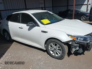 2016 Kia Optima LX with VIN KNAGT4L34G5071506, listed as a IAAI auction lot 41857078 with 72,029 mi miles. Bid and sale history available at carsss.com. Image 1.