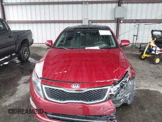 2014 Kia Optima SX Turbo with VIN 5XXGR4A60EG286453, listed as a IAAI auction lot 41661379 with 163,206 mi miles and . Bid and sale history available at DreamBid. Image 12.