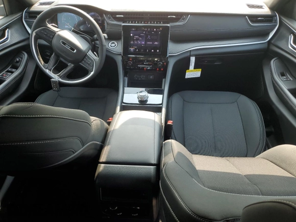 2025 Jeep Grand Cherokee Altitude X with VIN 1C4RJHAG6SC299400, listed as a Copart auction lot 59203595 with 2,235 mi miles and Salvage title. Bid and sale history available at DreamBid. Image 8.