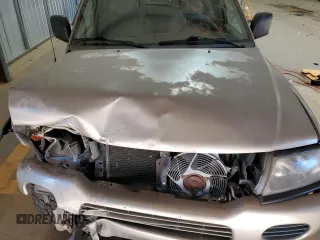 2002 Mitsubishi Montero ES z VIN JA4LS21H32J058330, wystawiony jako Copart lot #83523844 z przebiegiem 186 781 mil mil oraz Szkoda całkowita • Salvage title. Historia ofert i sprzedaży dostępna na DreamBid. Obrazek 13.