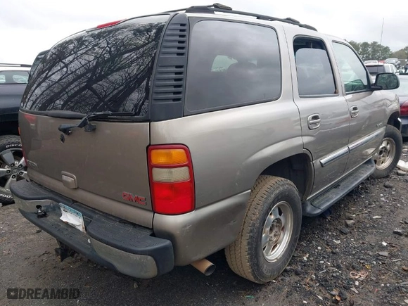2003 GMC Yukon SLT with VIN 1GKEC13Z23R141573, listed as a IAAI auction lot 41872751 with 1 mi miles. Bid and sale history available at carsss.com. Image 4.