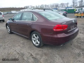 2013 Volkswagen Passat SE w/Sunroof with VIN 1VWBP7A32DC057999, listed as a IAAI auction lot 42040398 with 79,087 mi miles. Bid and sale history available at carsss.com. Image 3.