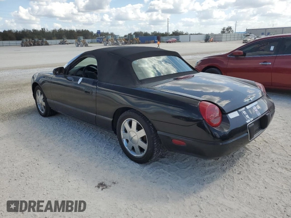 2002 Ford Thunderbird Hardtop Premium with VIN 1FAHP60A12Y120989, listed as a Copart auction lot 77573084 with Not Provided miles and Salvage Title. Bid and sale history available at DreamBid. Image 2.
