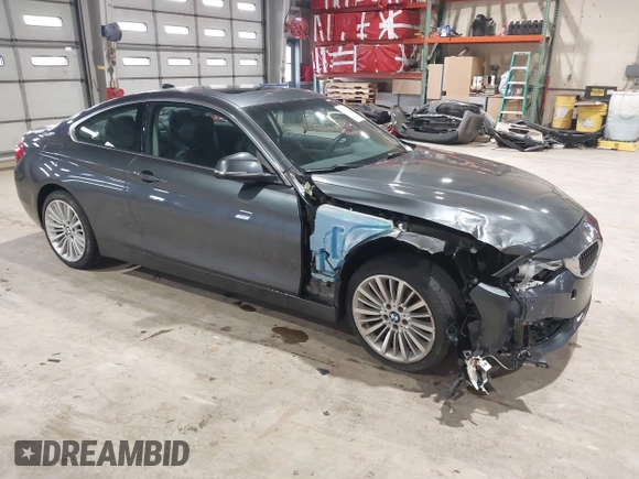 2014 BMW 4 Series 428i xDrive with VIN WBA3N9C56EF721564, listed as a IAAI auction lot 41737409 with 42,052 mi miles and . Bid and sale history available at DreamBid. Image 1.