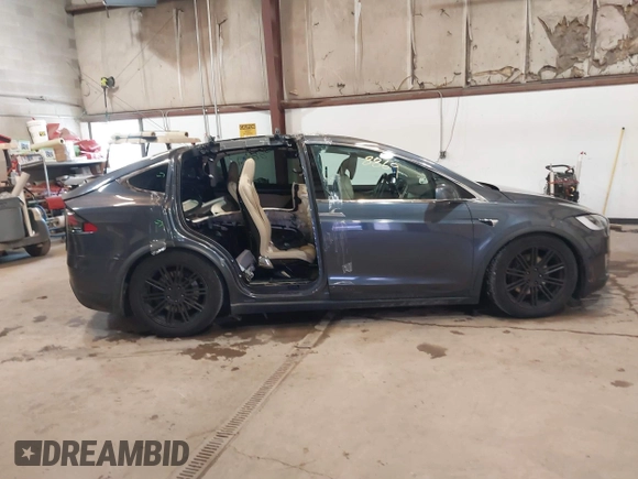 2016 Tesla Model X 70D with VIN 5YJXCBE2XGF025303, listed as a IAAI auction lot 41558869 with 77,793 mi miles and . Bid and sale history available at DreamBid. Image 14.