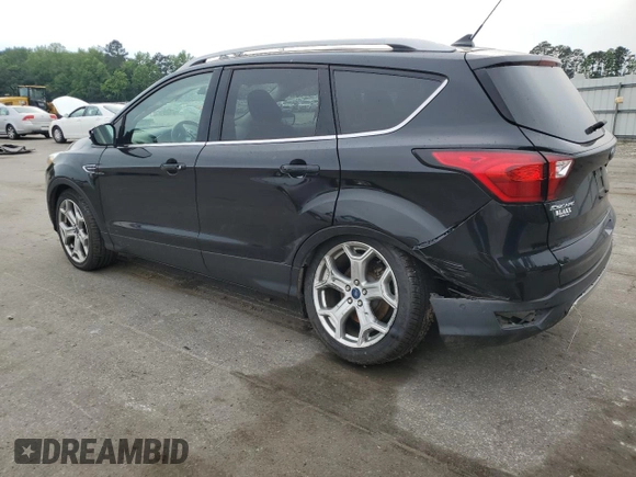 2019 Ford Escape Titanium with VIN 1FMCU0J95KUB14713, listed as a Copart auction lot 55887895 with 85,414 mi miles and Salvage title. Bid and sale history available at DreamBid. Image 2.