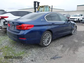 2019 BMW 5 Series 530e iPerformance with VIN WBAJA9C59KB389898, listed as a IAAI auction lot 41479595 with 90,965 mi miles. Bid and sale history available at carsss.com. Image 4.