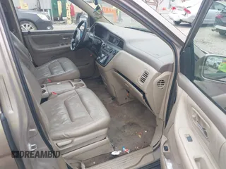 2003 Honda Odyssey EX-L z VIN 5FNRL18973B122173, wystawiony jako IAAI lot #42252018 z przebiegiem 204 487 mil mil oraz . Historia ofert i sprzedaży dostępna na DreamBid. Obrazek 5.